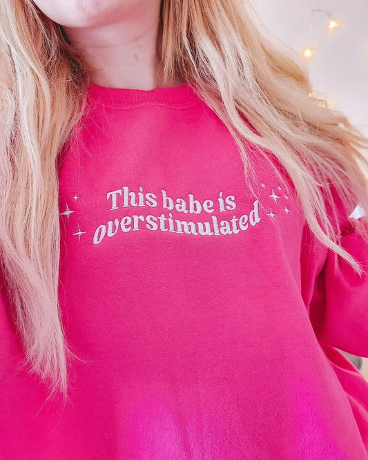 Premium This Babe Is Overstimulated crewneck sweatshirt