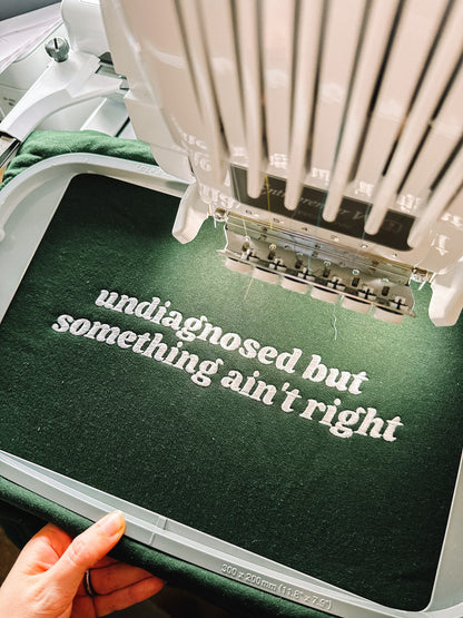 Undiagnosed But Something Ain’t Right crewneck sweatshirt