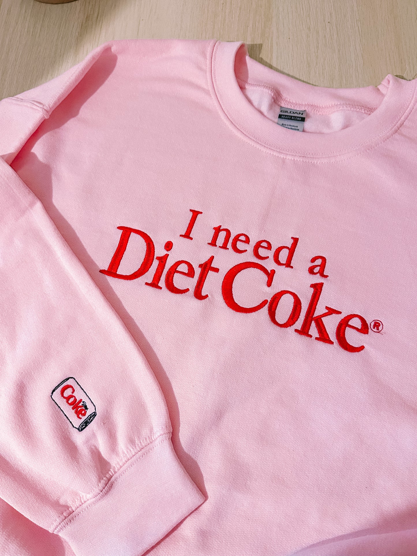 I Need A Diet Coke embroidered crewneck sweatshirt with sleeve detail