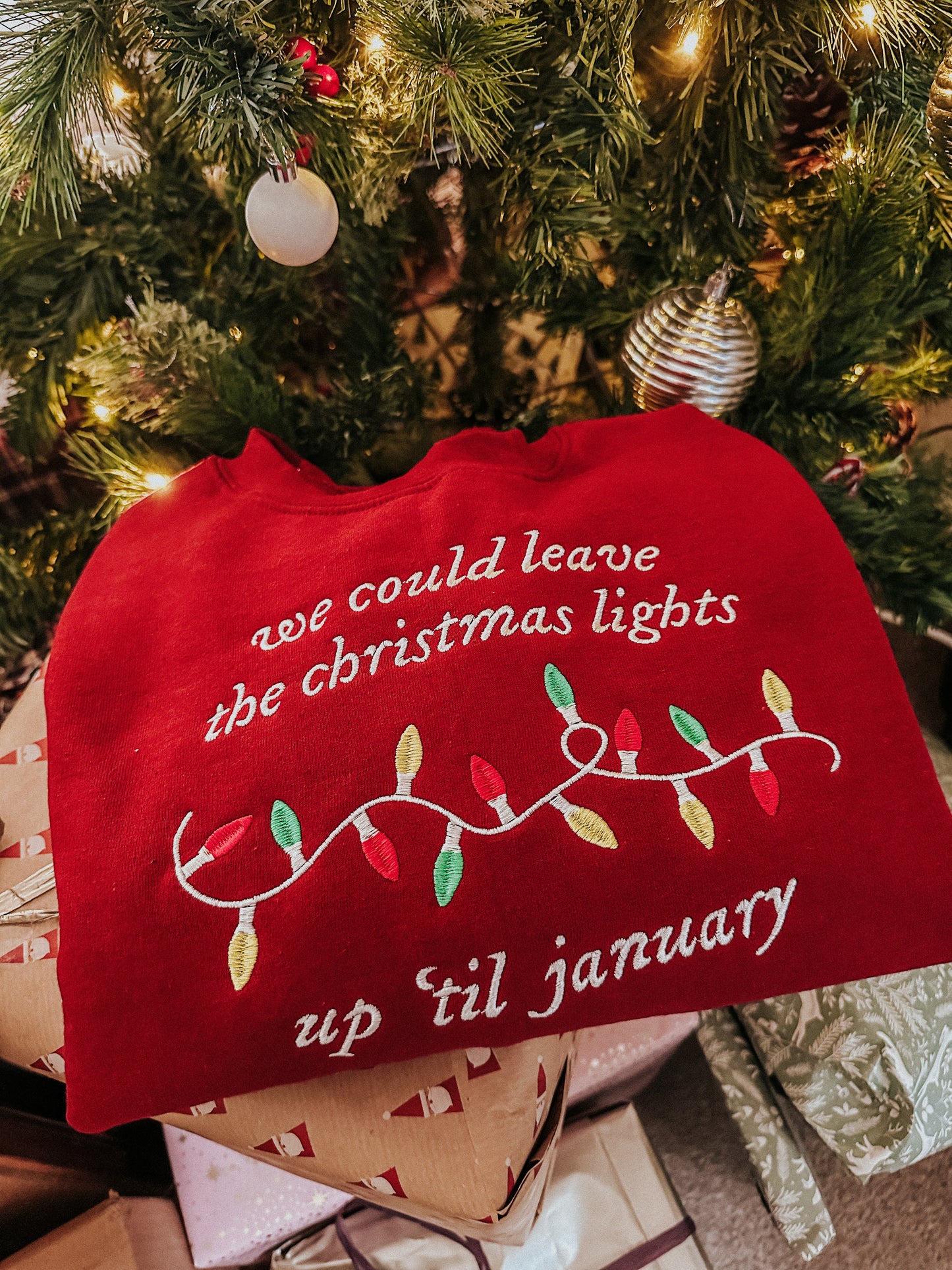 We Could Leave The Christmas Lights Up Til January embroidered crewneck