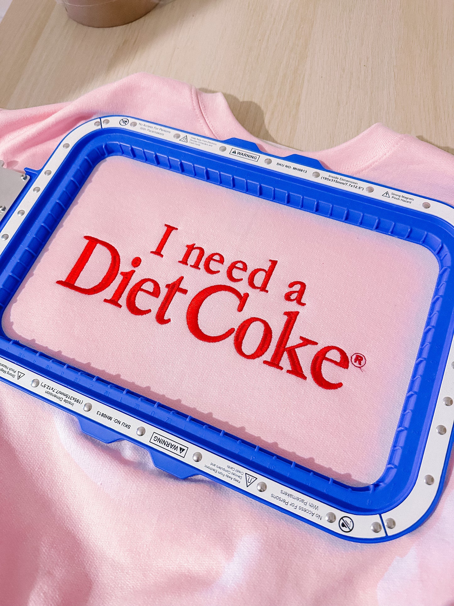 I Need A Diet Coke embroidered crewneck sweatshirt with sleeve detail