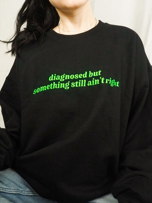 Diagnosed But Something Still Ain’t Right embroidered crewneck sweatshirt